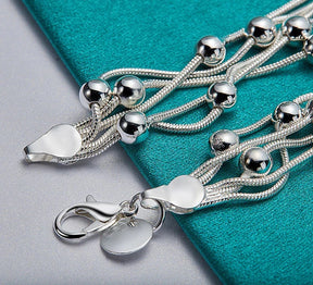 Pulseira - Cordas e Perolas